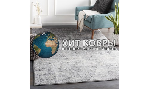 Серый ковер в интерьере гостиной